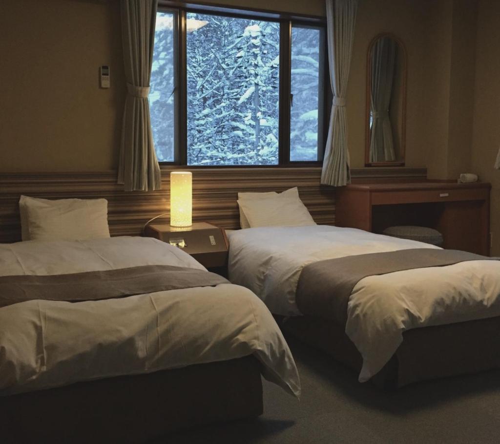 Hakuba Landmark Iwatake Lodge Екстериор снимка