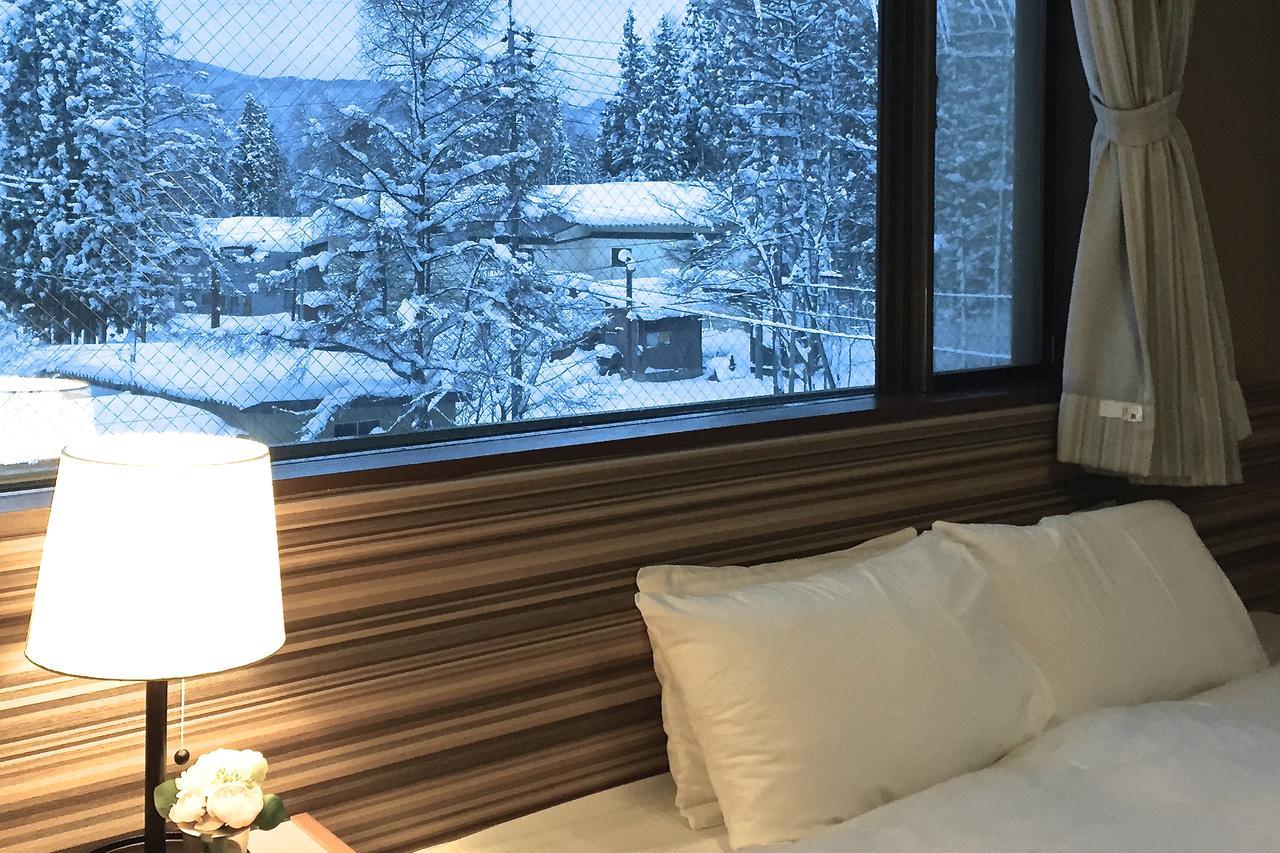 Hakuba Landmark Iwatake Lodge Екстериор снимка